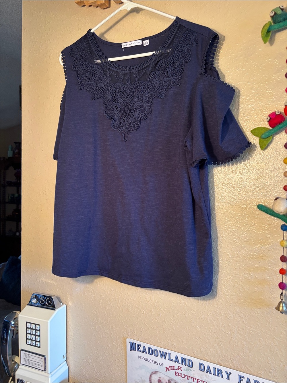 NWOT Notations short-sleeve top featuring intricate lace trim around the necklin